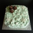 Chocolate sponge with mascarpone cheese, caramel and roasted walnuts filling. Fresh whipped cream, ready to roll icing decorations.
